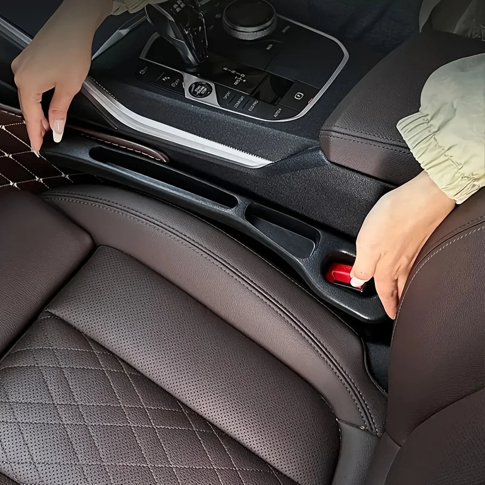 Car seat gap filler installed between driver and passenger seat to prevent dropped items