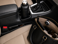 Road trip essentials bundle with clever travel gadgets laid flat on car seat